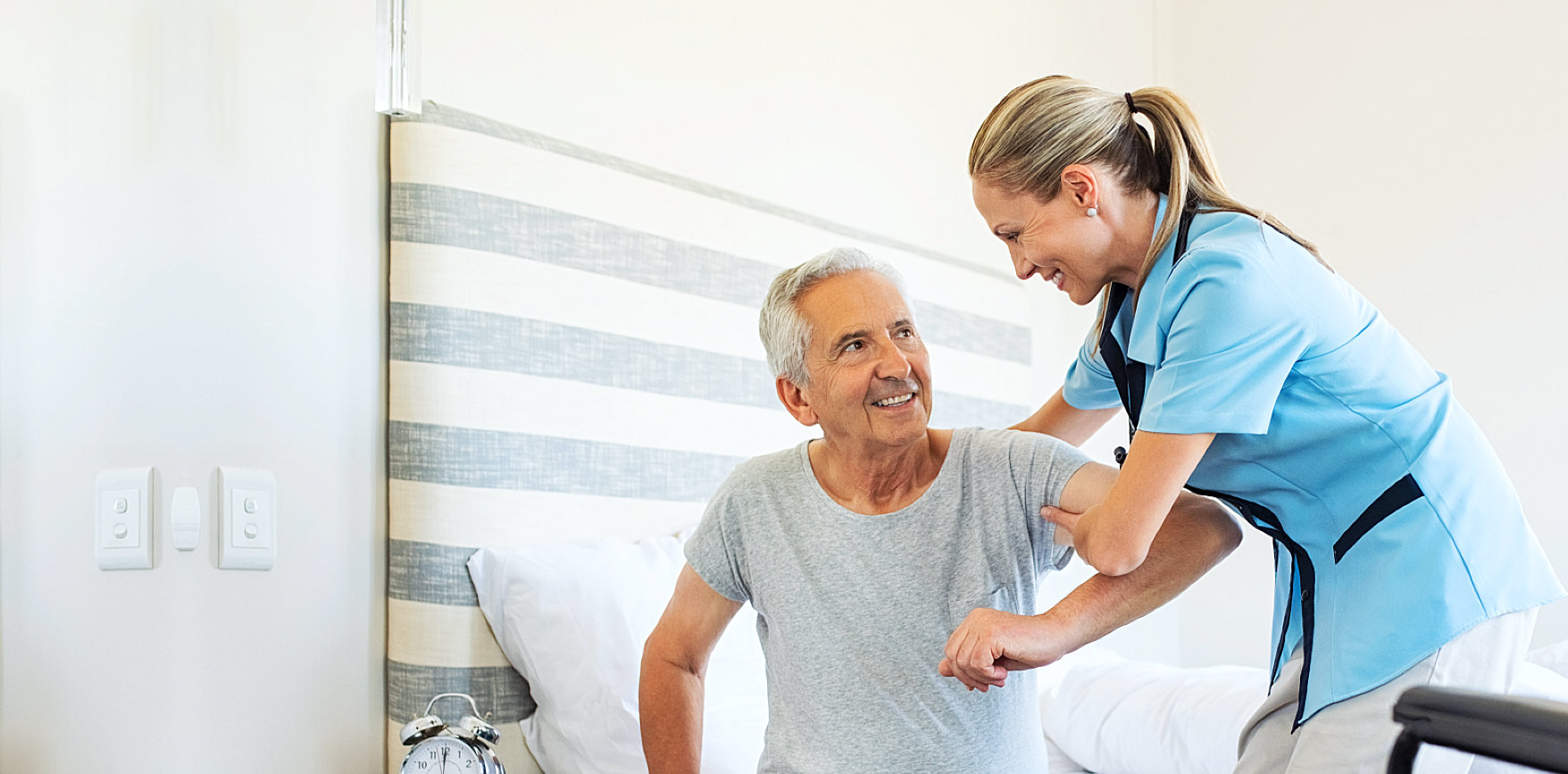 caregiver assisting patient