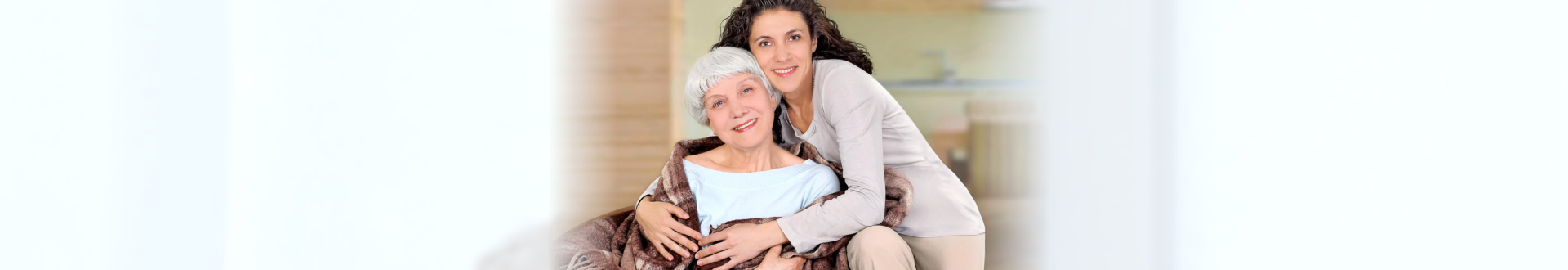 caregiver hugging patient